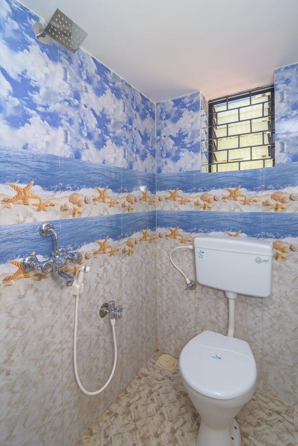 Casa Nobert Hotel Morjim Bagian luar foto
